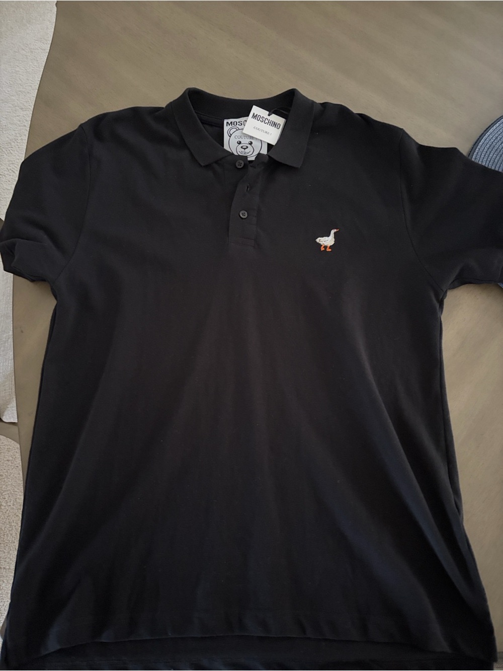 Moschino Black Polo Shirt with Embroidered White Goose